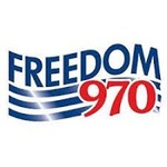 970.AM / KCMD logo